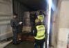 Genova, Guardia di Finanza dona in beneficenza abbigliamento sequestrato Dogane Genova Guardia Finanza container